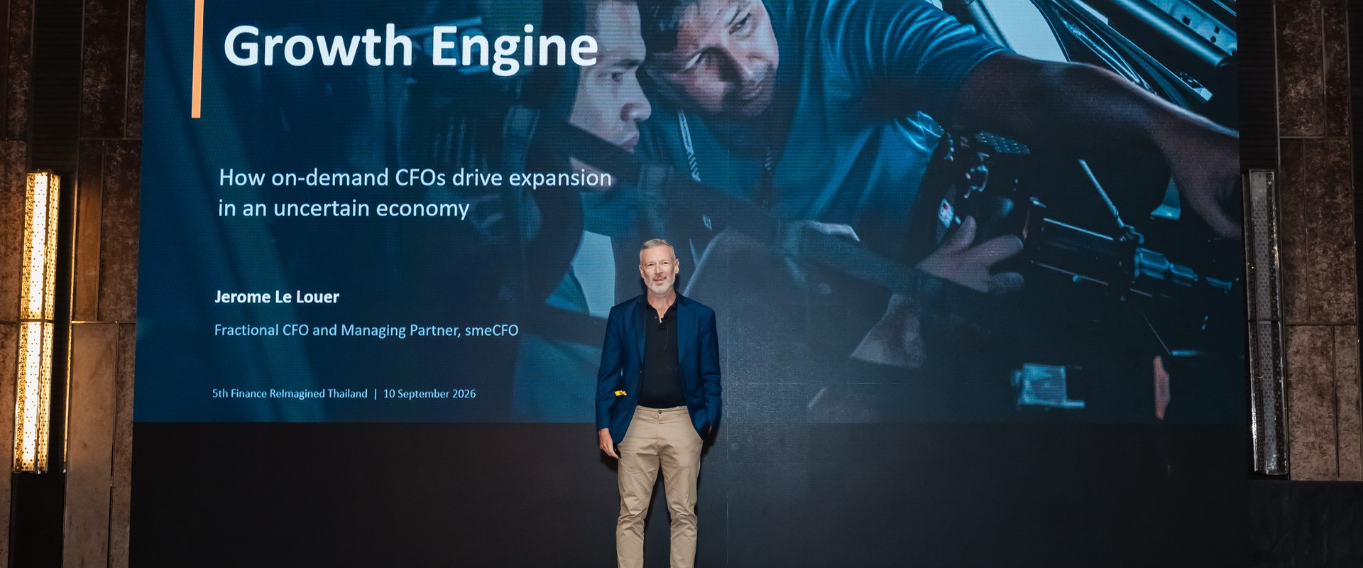 Jerome Le Louer on stage at Finance ReImagined Thailand 2026 in front of the title slide The Fractional Growth Engine